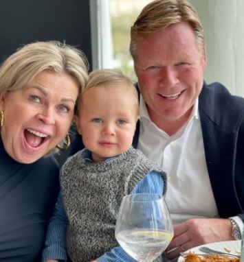 Bartina Koeman with her husband Ronald Koeman and their grandson.-1630945138199